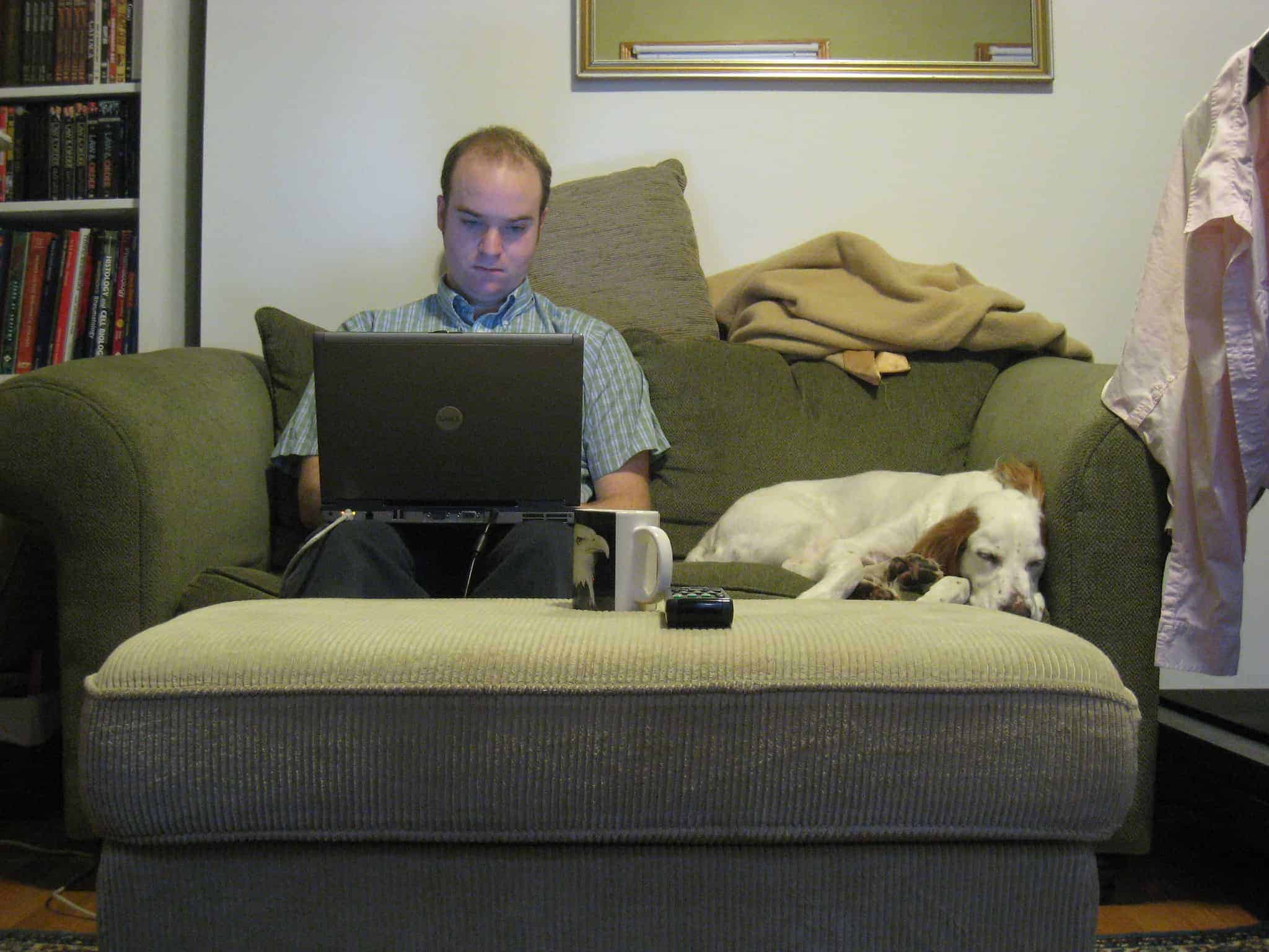 Picture of a man working from home to illustrate Remote Worker Setup blog post. Thanks to Logan Ingalls via https://www.flickr.com/photos/plutor/